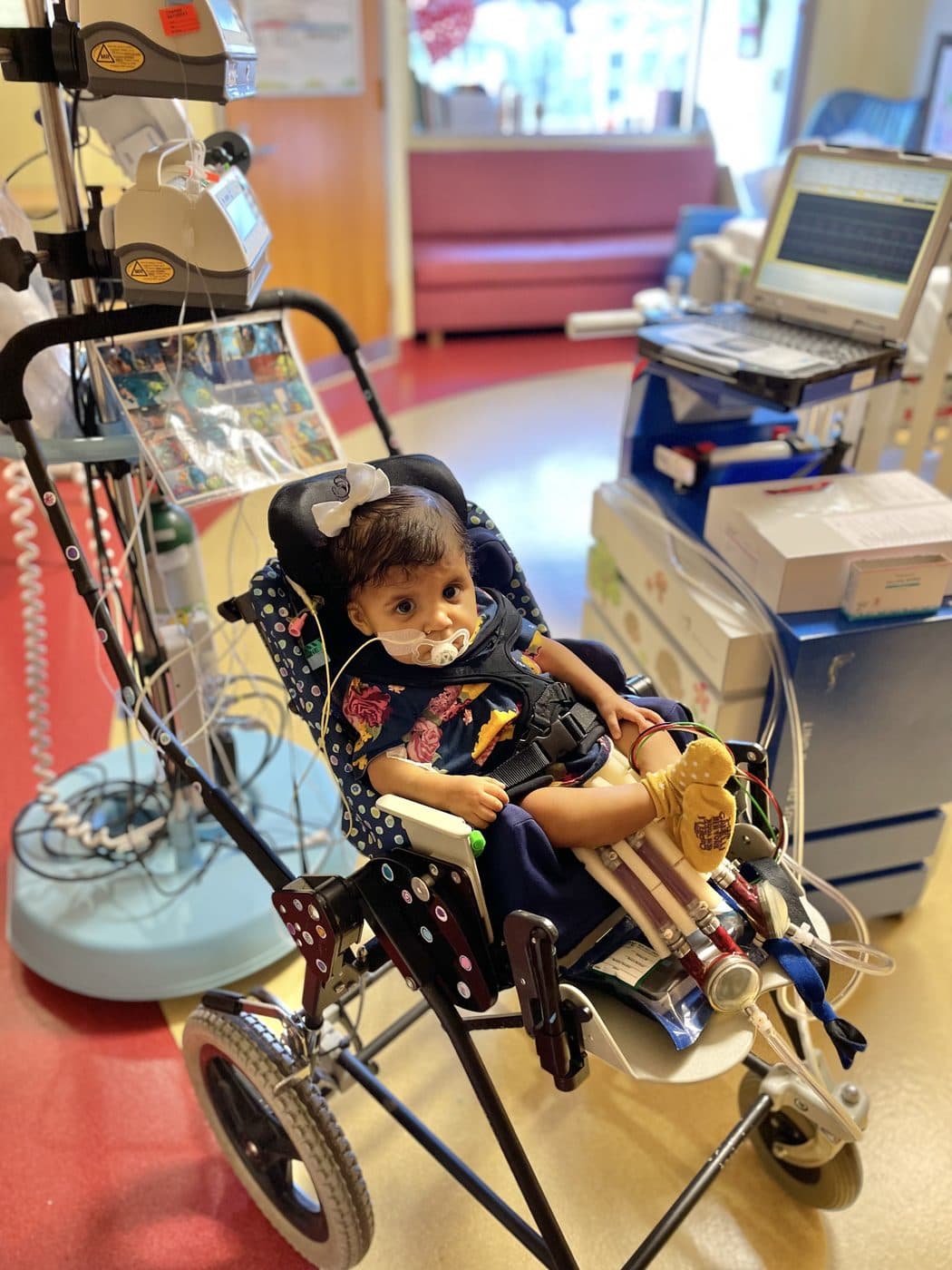 Jazzy smiling brightly during a walk through the hospital
